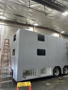 Attached siding to prep for paint