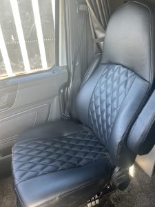 Upholstered Captain seats put into the cab